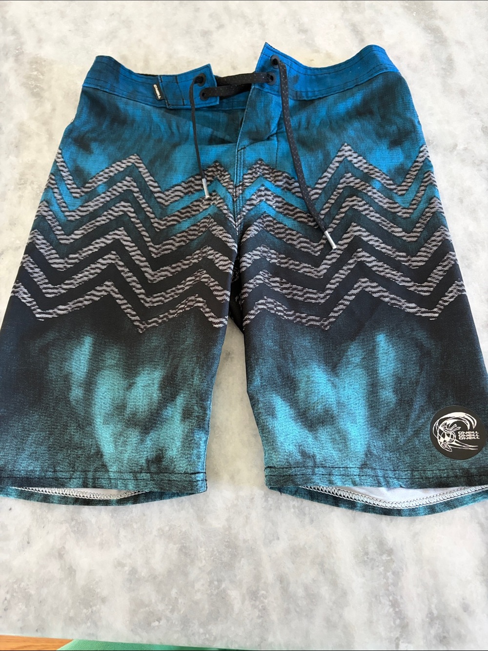 O'Neill Teal and Black Chevron Kids Swim Trunks